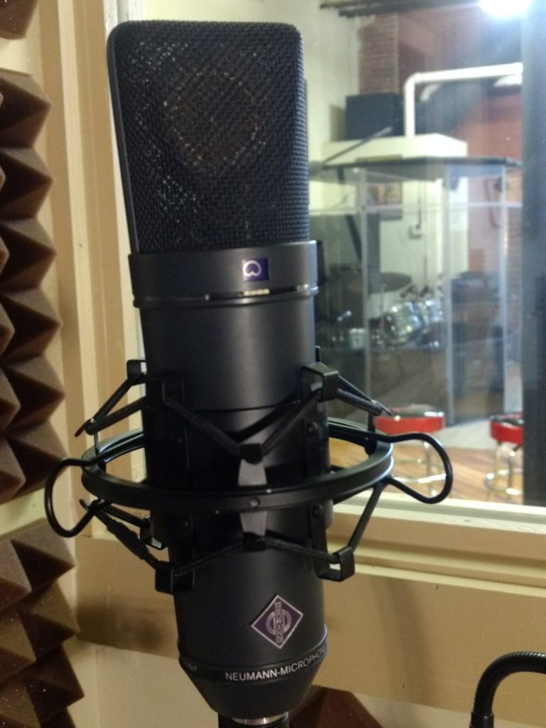 Our Neumann U87 microphone is just one of the many great mics our studio has!