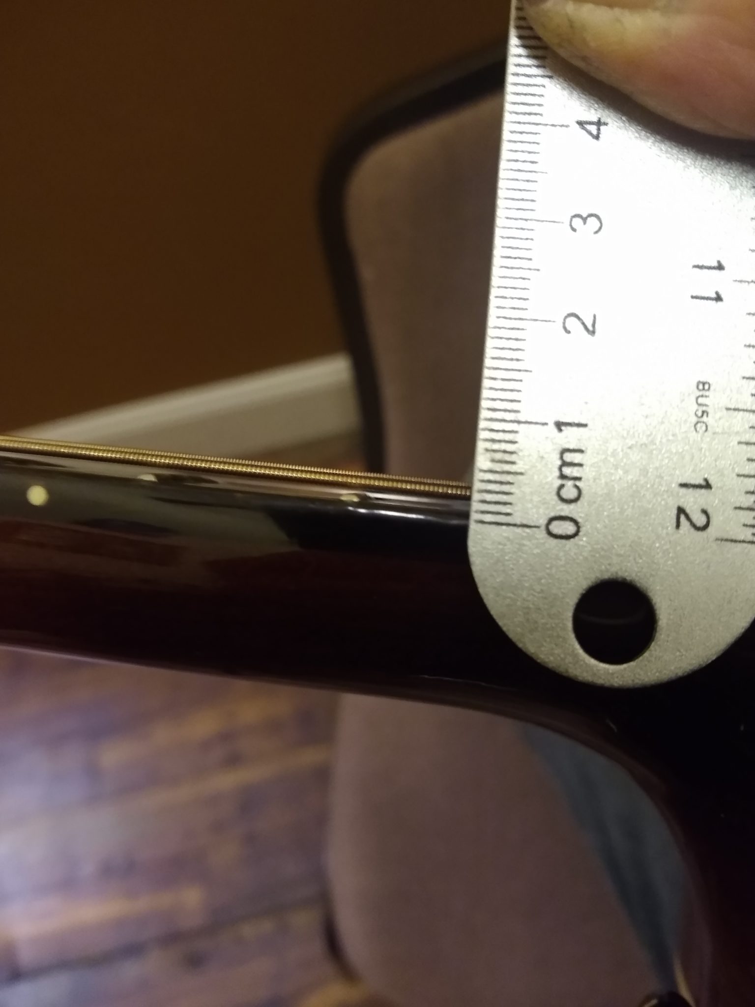 Fixing an Acoustic Guitar That Is Hard to Play